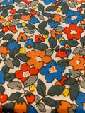 Orange/Blue Allover Flower on Cotton Lawn