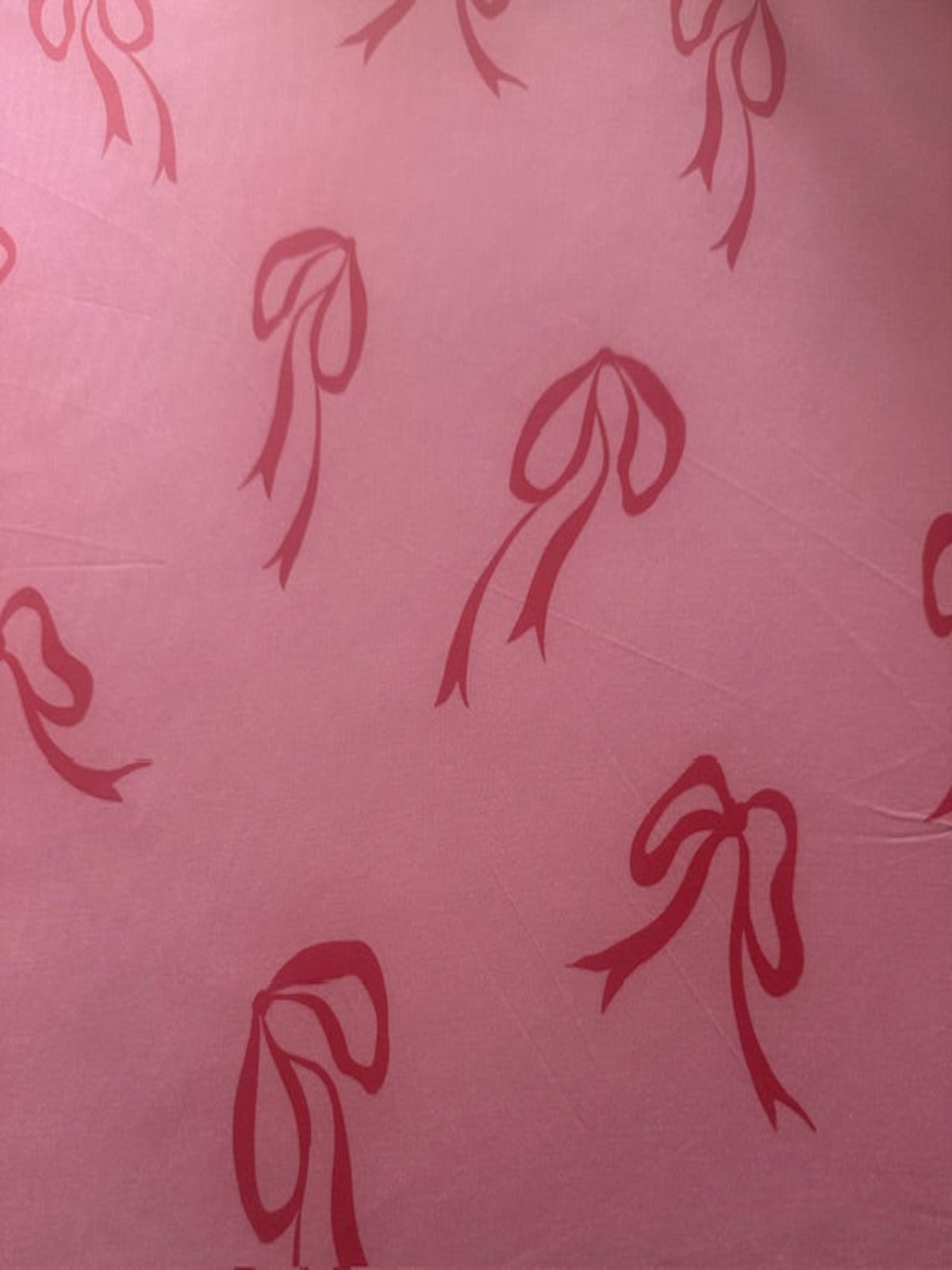 Red Bows on Bright Pink Satin Finish One Way Stretch Cotton