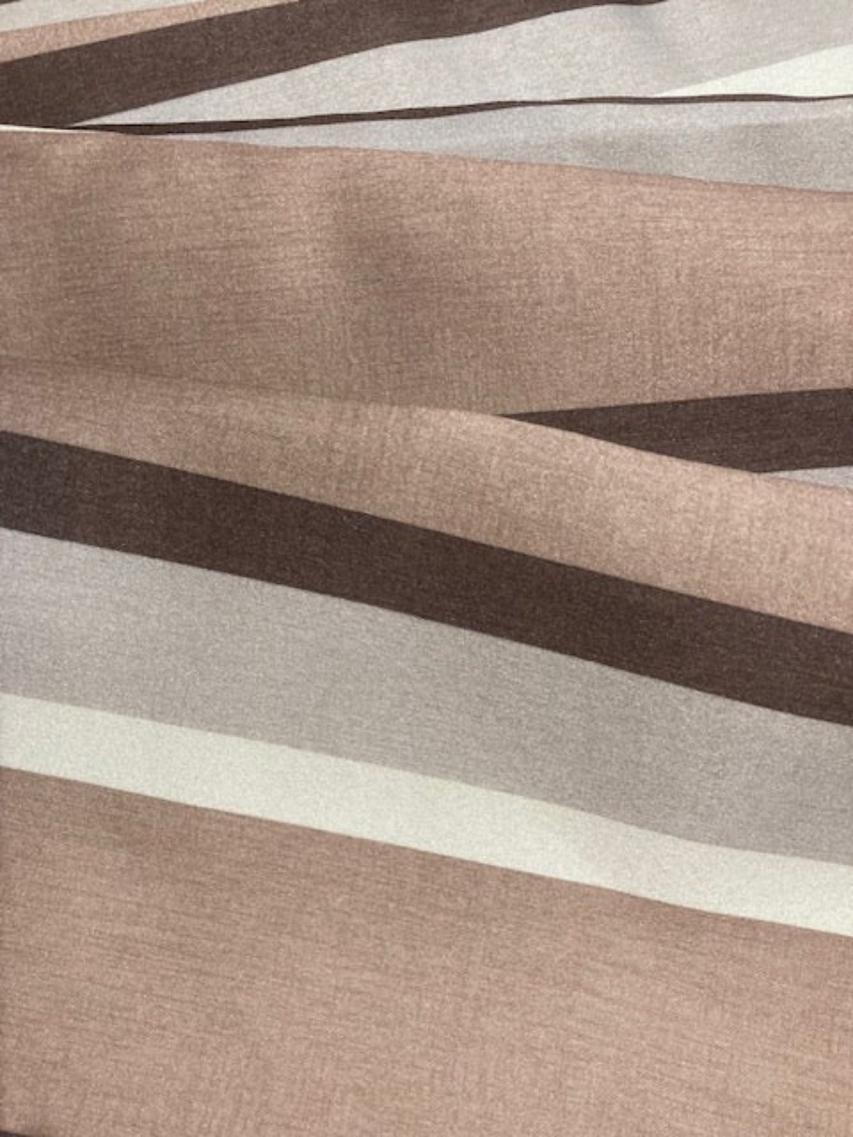 Coffee Tone Stripes. Stripes run along the fabric.