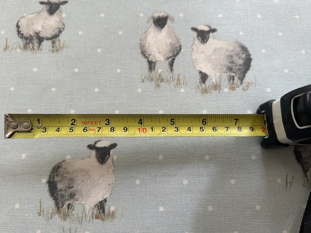 Sheep on Spotted Pale Blue Cotton Furnishing