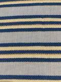 Blue Raised Stripe on Sky Blue with Bronze Lurex. Stripes run across the fabric. Lightweight.