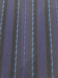 Navy/Pale Blue Stripe Raised Twill Suiting Weight. Stripes run along the fabric.