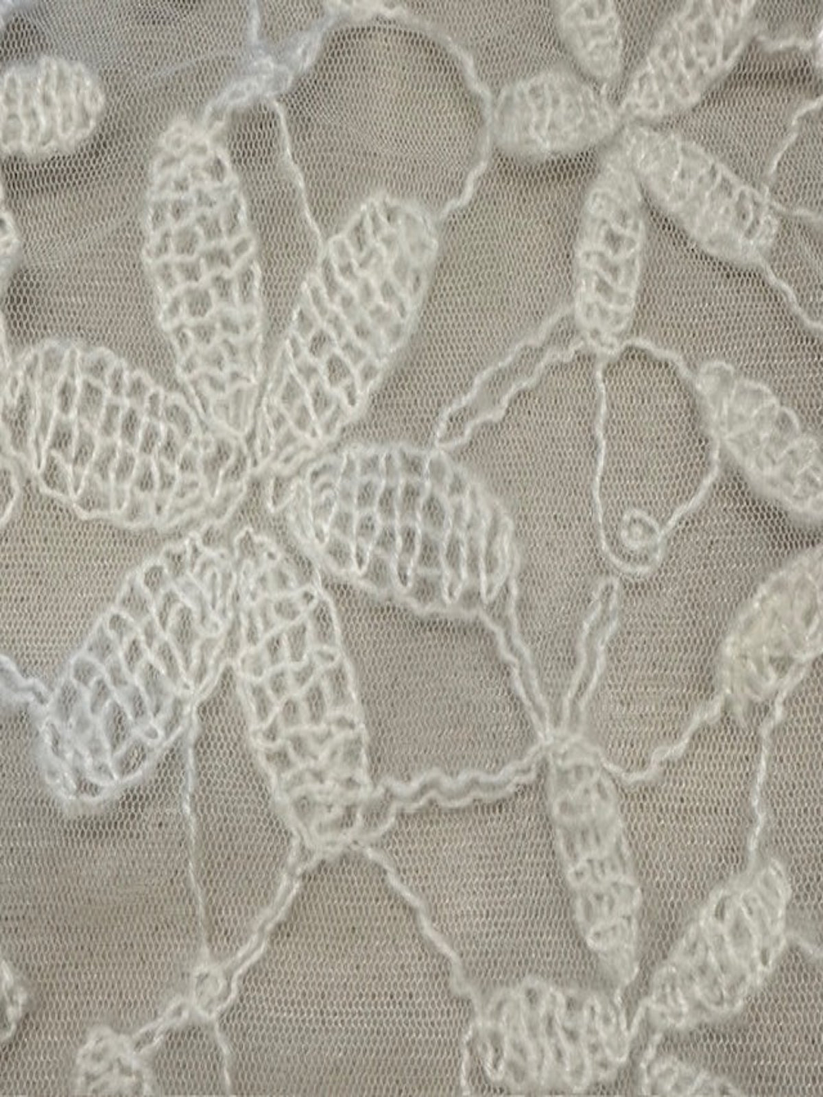 Crocheted Ivory Flower on Tulle