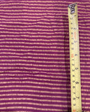 Fuchsia/Bronze Seersucker Stripe. Stripes run across the fabric.