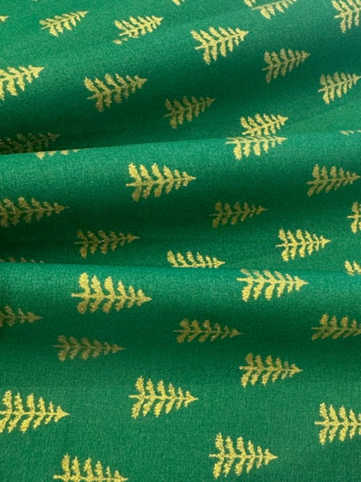 Simple Metallic Christmas Trees on Green Cotton