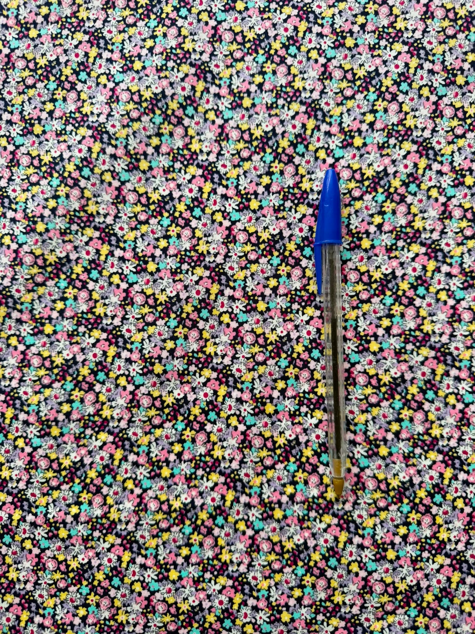 112cm Wide Multicoloured Ditzy Floral Cotton Fabric on Black – 100% Cotton