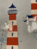 Red/Blue Lighthouses on Pale Blue PVC Coated Cotton