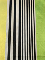 Lemon/Lime/Black Stripes Satin Faced. Stripes run along the Fabric