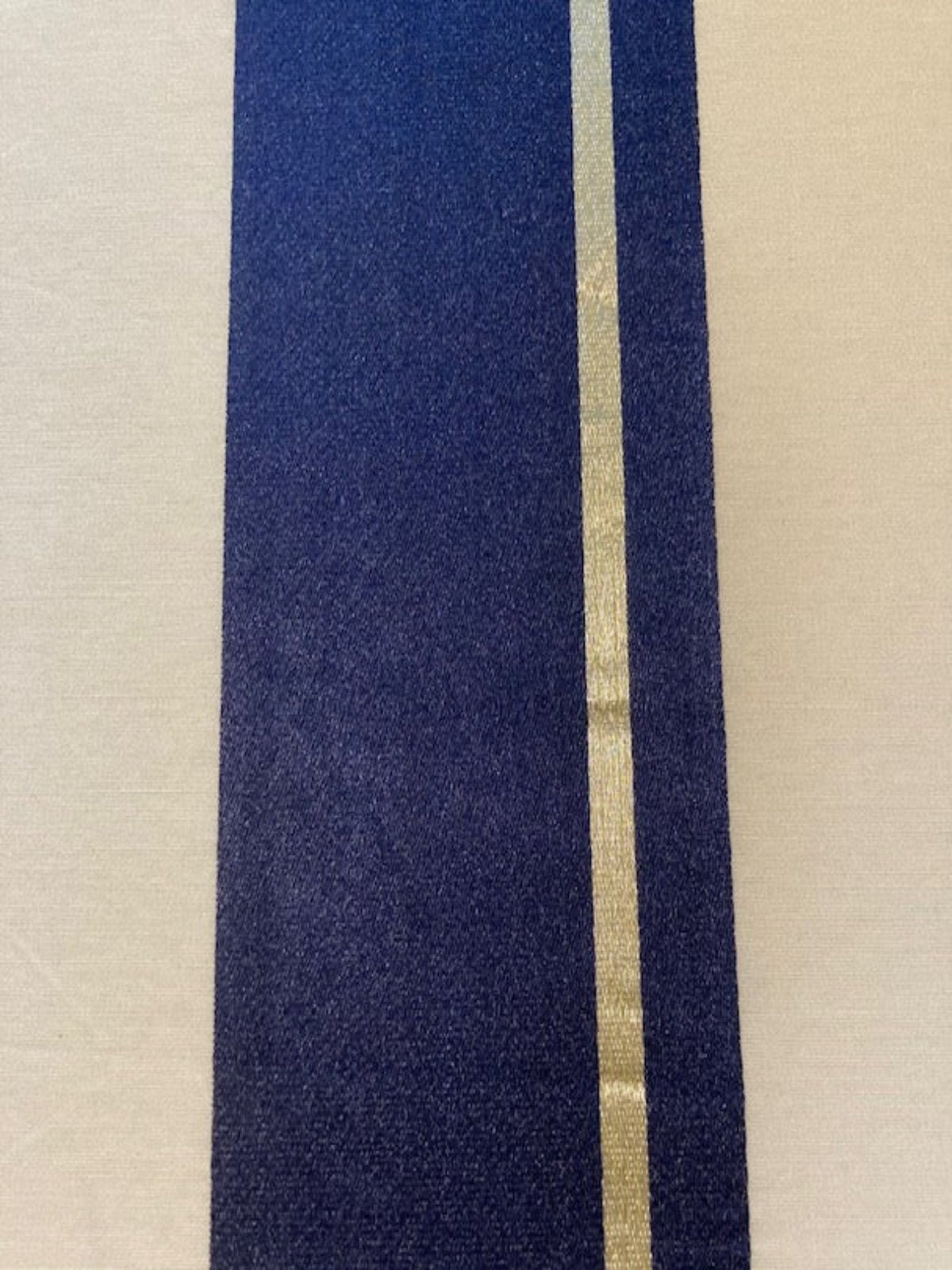 Navy/Ivory Stripe with Gold Lurex Stripe. Stripes run along the Fabric