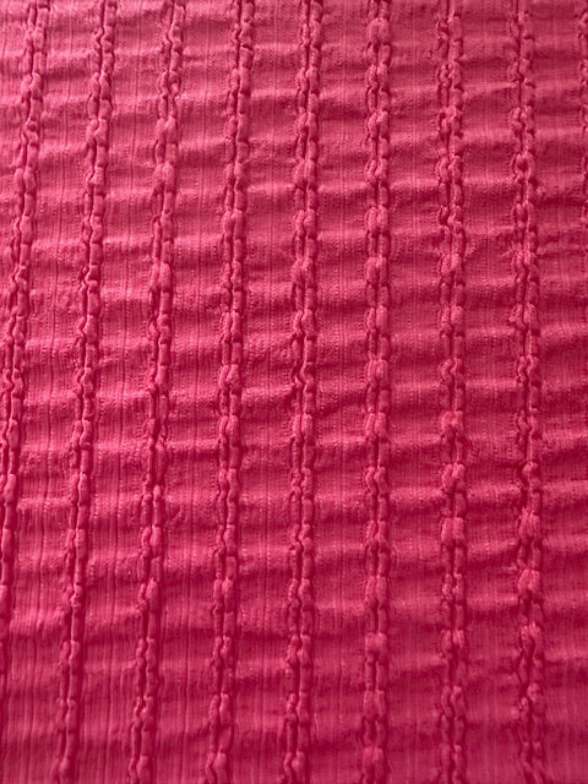 Bubble Pink Textured Irregular Self Colour Stripe. Stripes run along the fabric.