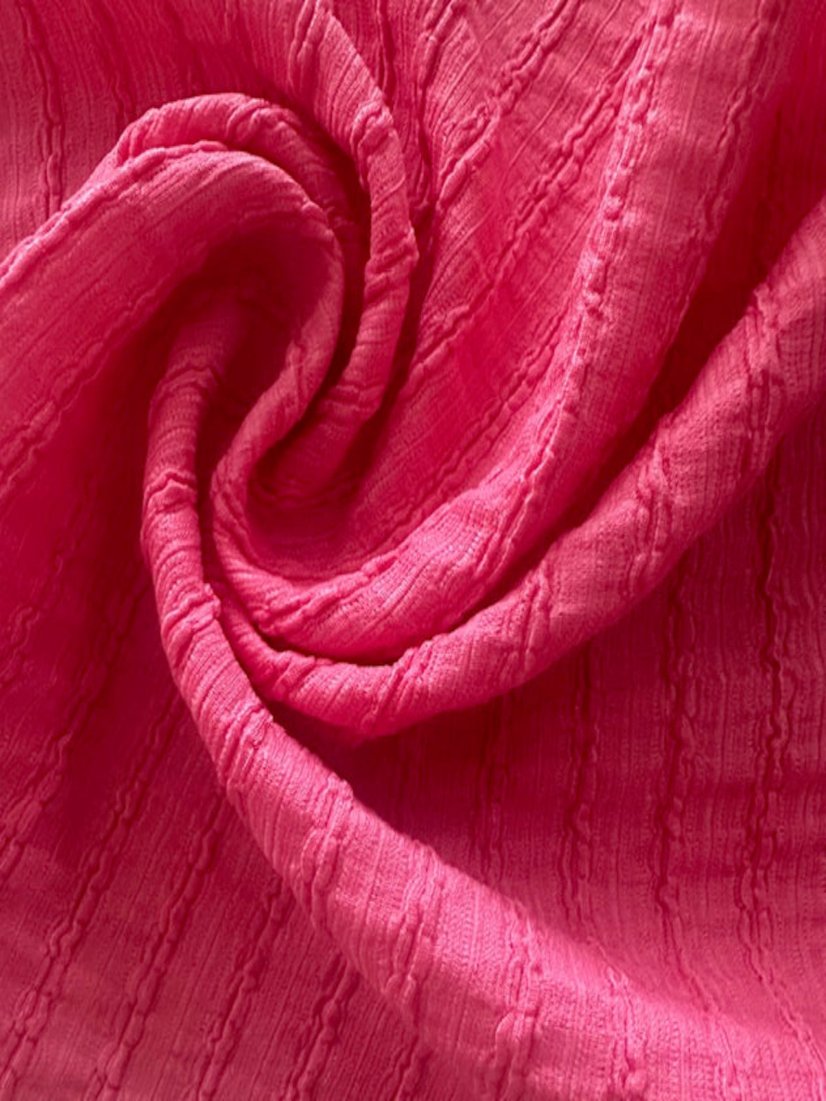 Bubble Pink Textured Irregular Self Colour Stripe. Stripes run along the fabric.