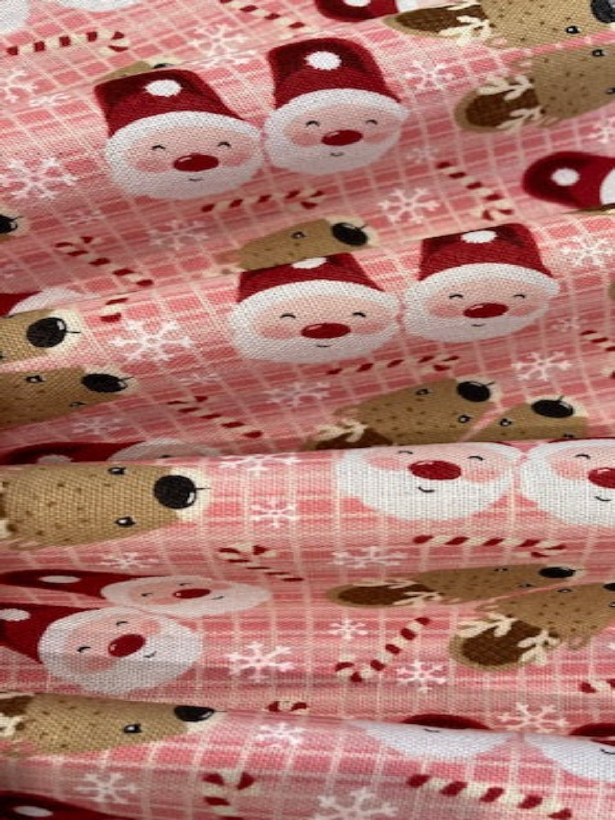 Father Christmas & Reindeer on Pink Cotton Poplin