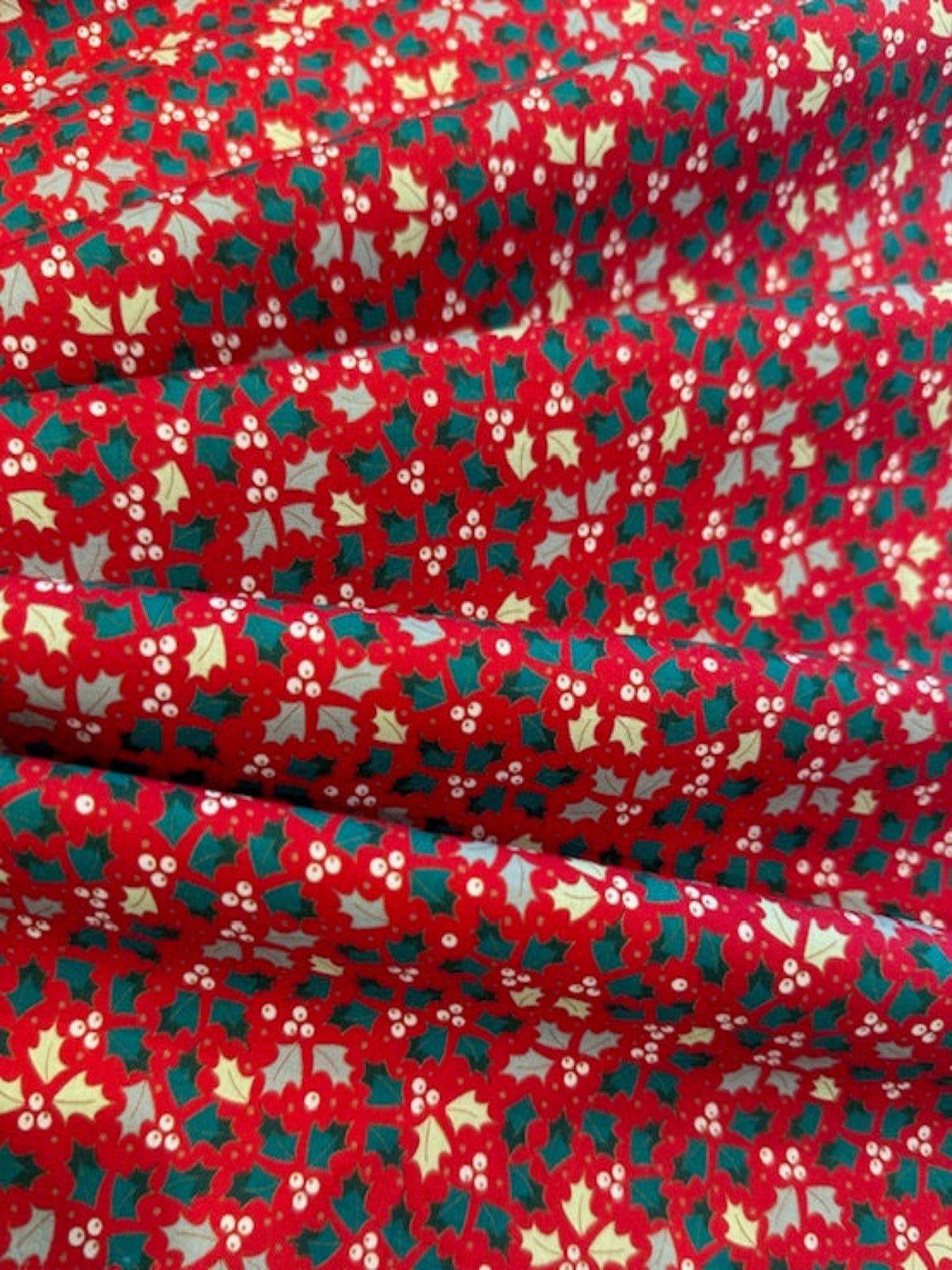 Christmas Mixed Green Small Hollies on Red Cotton&nbsp;