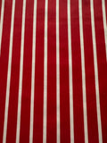 Red Butcher Stripe with stretch. Stripes run along the Fabric.