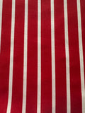 Red Butcher Stripe with stretch. Stripes run along the Fabric.