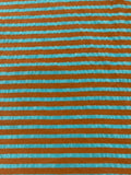 Sea Green/Burnt Orange seersucker Stripe with Sheen on the sea Green. Stripes run across the fabric.