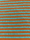 Sea Green/Burnt Orange seersucker Stripe with Sheen on the sea Green. Stripes run across the fabric.