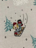 Snoopy on Christmas Sledge on Silver Cotton