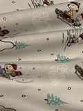 Snoopy on Christmas Sledge on Silver Cotton