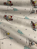 Snoopy on Christmas Sledge on Silver Cotton