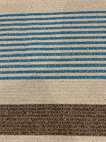 Blue/Brown Woven Stripe on Ivory with Silver Lurex Detail. Stripes run across the fabric.