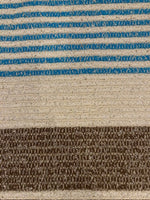 Blue/Brown Woven Stripe on Ivory with Silver Lurex Detail. Stripes run across the fabric.