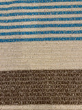 Blue/Brown Woven Stripe on Ivory with Silver Lurex Detail. Stripes run across the fabric.