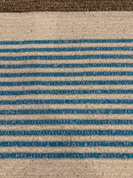 Blue/Brown Woven Stripe on Ivory with Silver Lurex Detail. Stripes run across the fabric.