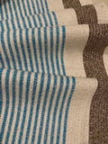 Blue/Brown Woven Stripe on Ivory with Silver Lurex Detail. Stripes run across the fabric.