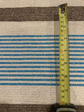 Blue/Brown Woven Stripe on Ivory with Silver Lurex Detail. Stripes run across the fabric.