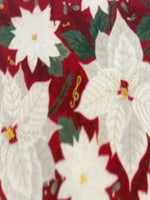 Christmas White Poinsettia on Red Cotton