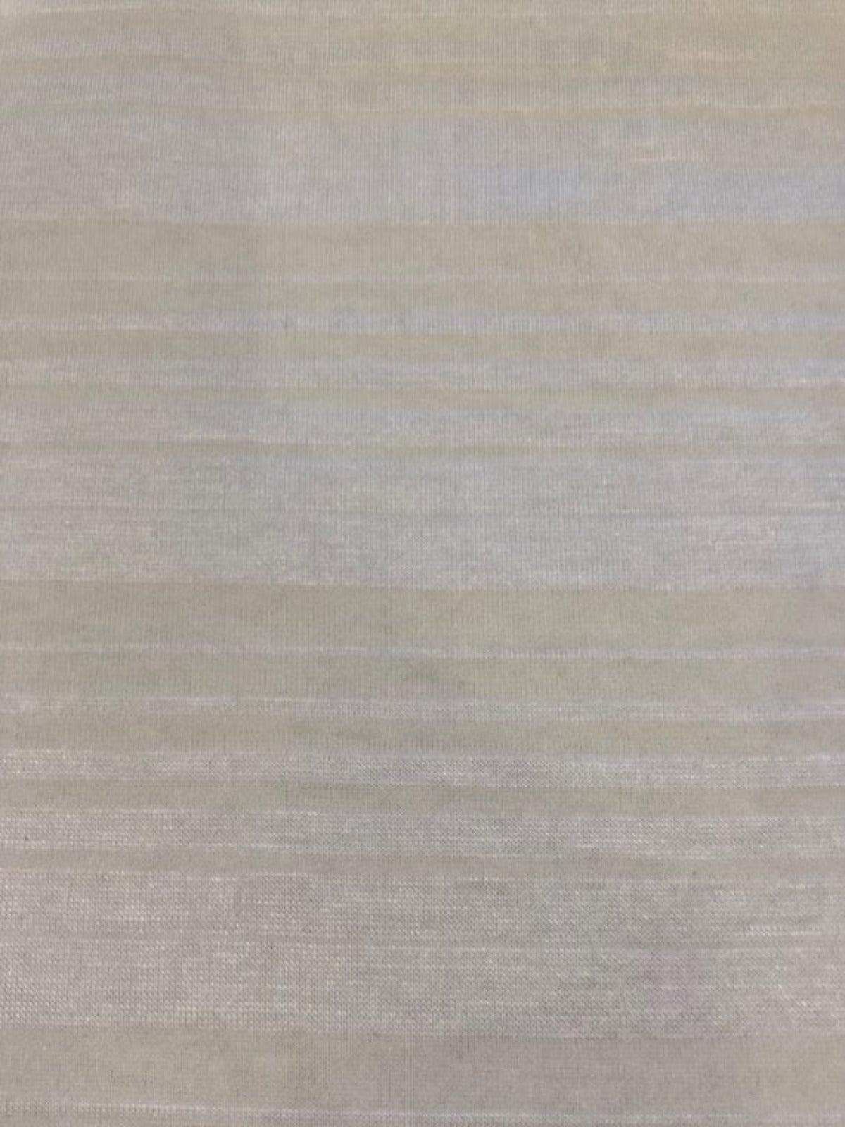 Pale Yellow/White Knitted Stripe. Stripes run across the fabric.