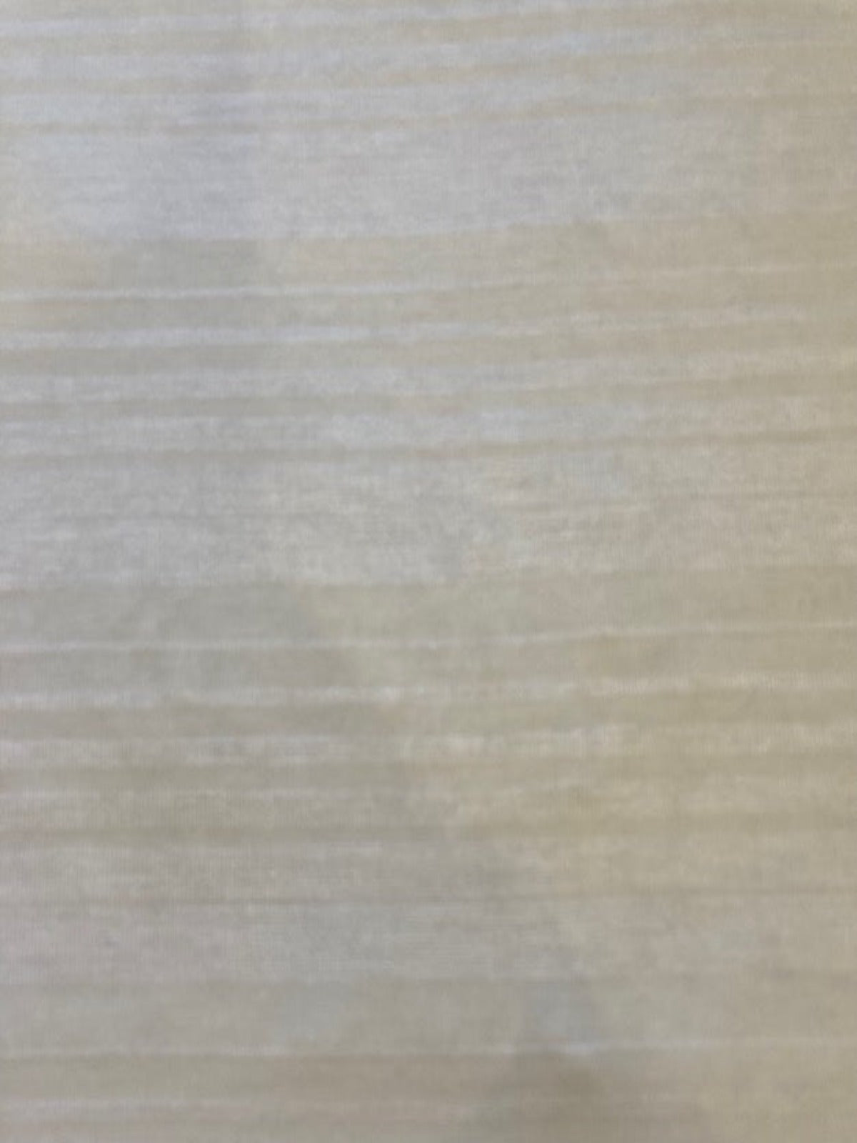 Pale Yellow/White Knitted Stripe. Stripes run across the fabric.