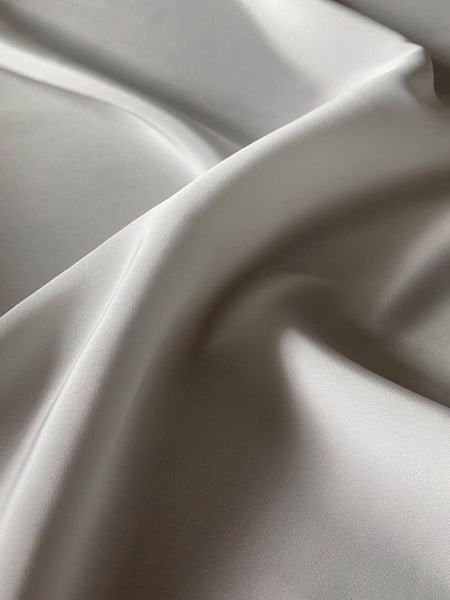 Ivory plain weave with slight luste - Deadstock fabric on AmoThreads