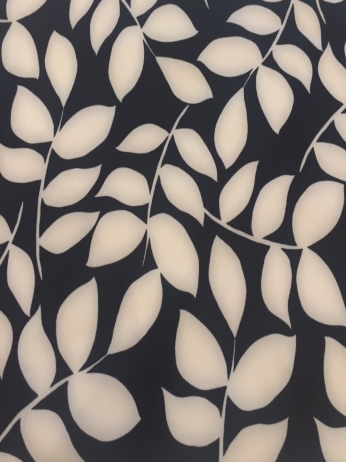 Ivory on Black Leaf Mono Print on Stretch Woven - Deadstock fabric on AmoThreads