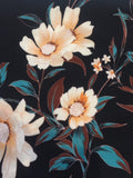 Pale Gold Trailing Flowers on Black Woven Crepe - Deadstock fabric on AmoThreads