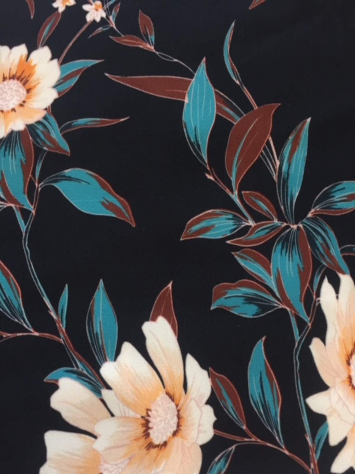 Pale Gold Trailing Flowers on Black Woven Crepe - Deadstock fabric on AmoThreads