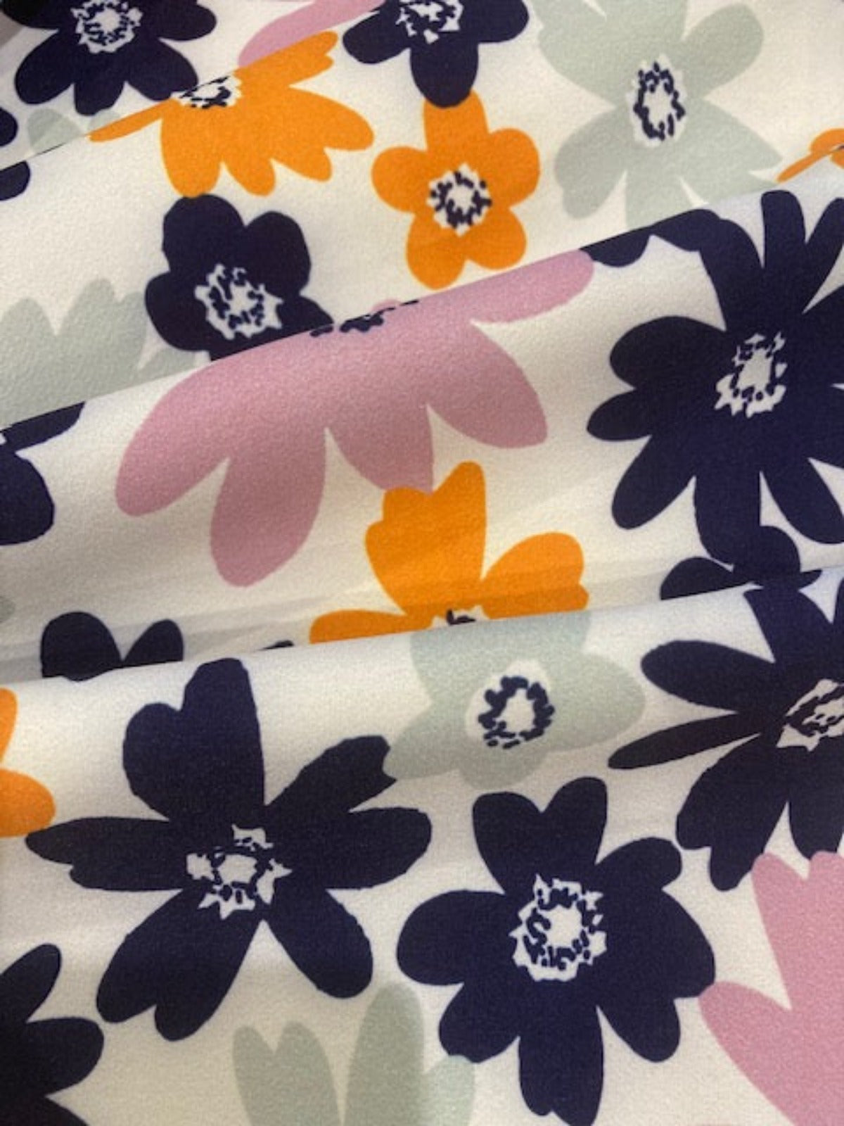 Navy/Orange Daisies on Ivory Crepe Jersey