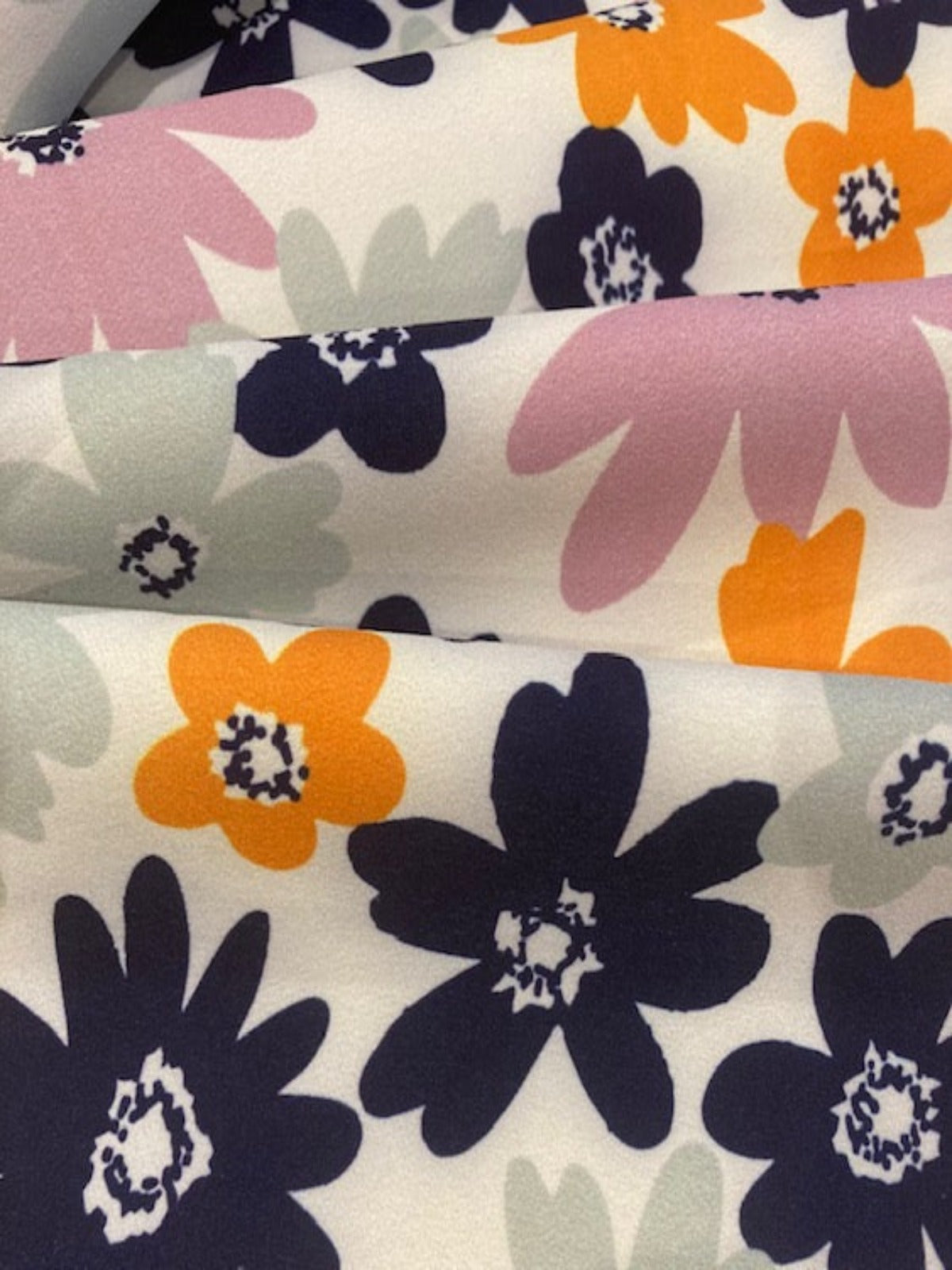 Navy/Orange Daisies on Ivory Crepe Jersey