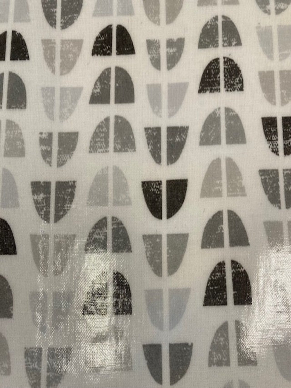 Grey Circular Quarters on White PVC Coated Cotton