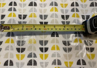 Yellow / Grey Circular Quarters on White PVC Coated Cotton