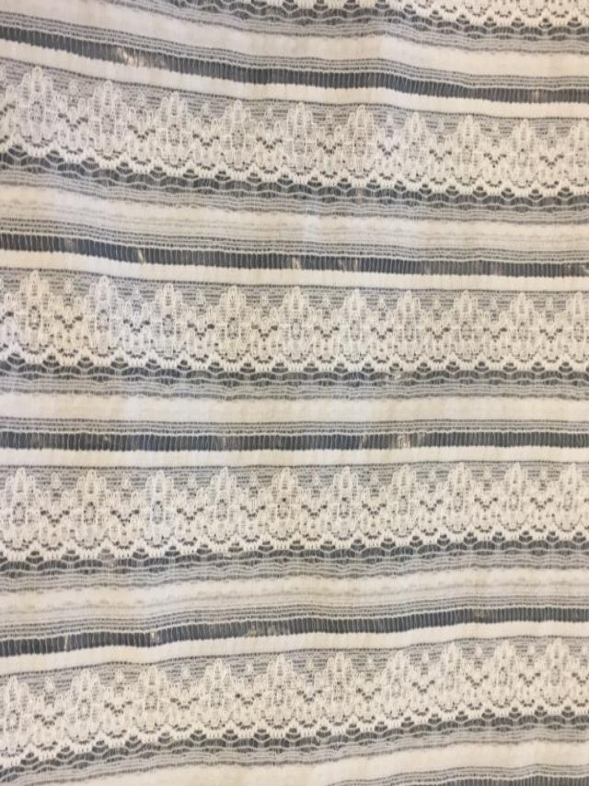 Ivory directional stretch lace with silver lurex thread - Deadstock fabric on AmoThreads