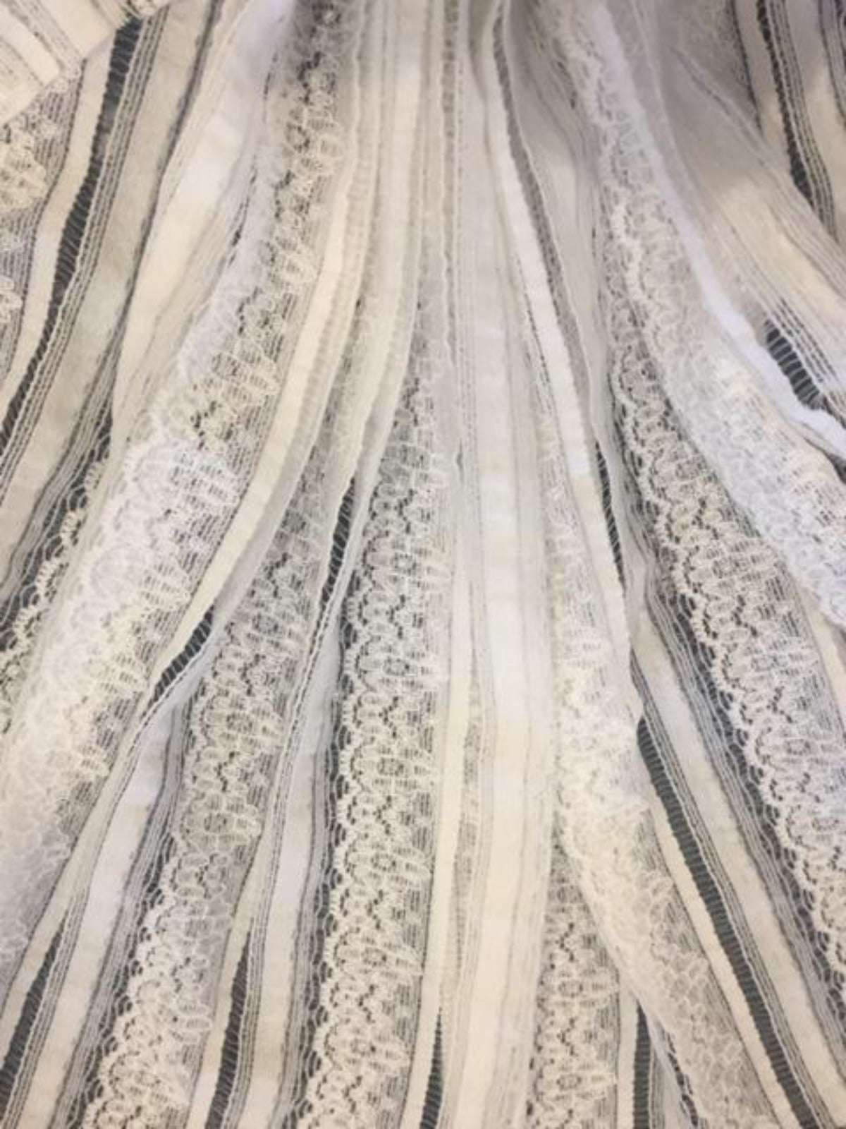 Ivory directional stretch lace with silver lurex thread - Deadstock fabric on AmoThreads