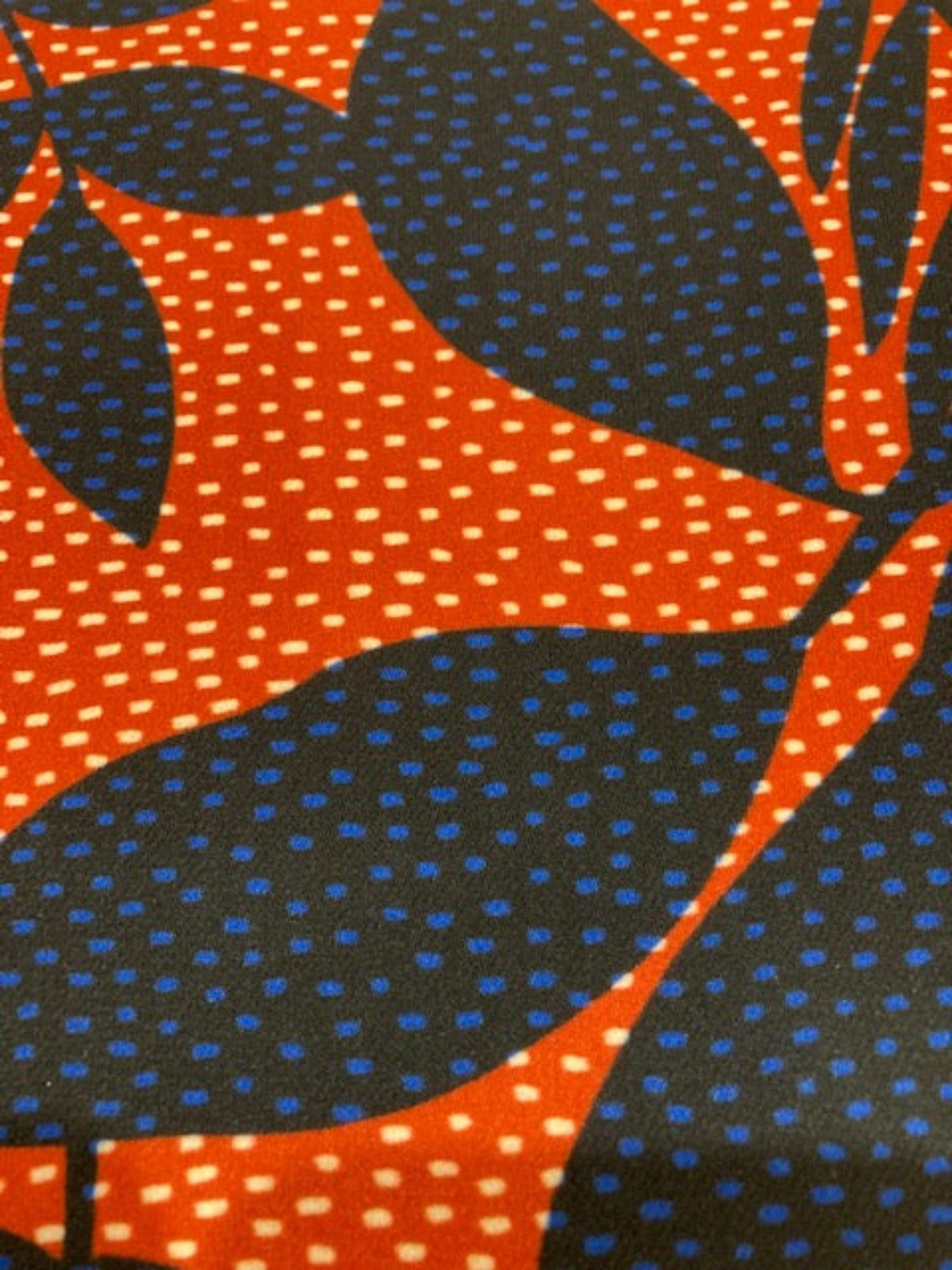 Navy Leaf Print on Red Spotted Background on Smooth Handle Crepe