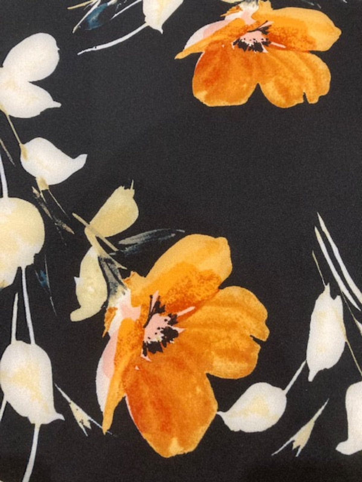 Orange Flowers on Black Woven Crepe With Stretch