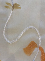 Orange Glitter Print with Ribbon Swirl on Ivory Crepe De Chine
